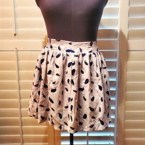 Super cute skater skirt with blue velvet feathers. Forever 21 size L